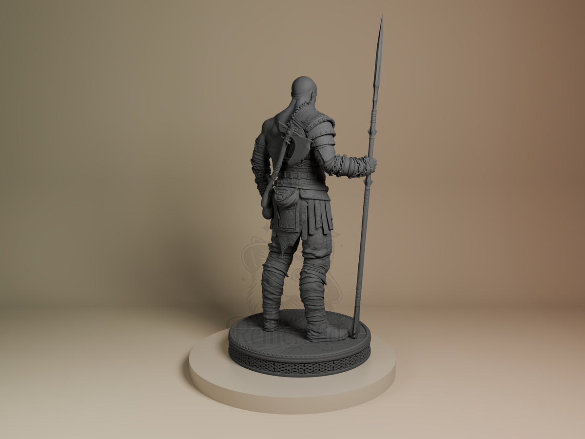 Kratos resin figure from God of War shown from behind, holding a spear, wearing detailed armor and wrappings on an textured base, unpainted gray.