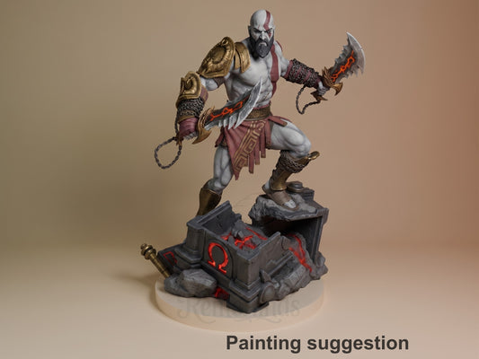 Painted Kratos from God of War resin figure poses with chained blades on a sculpted lava base.