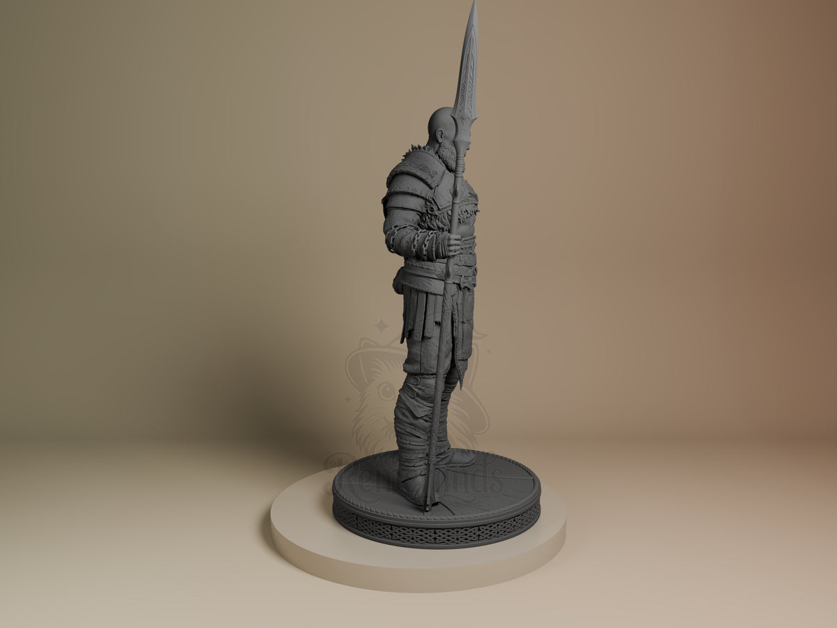 Kratos resin figure shown from the side, holding his signature blade aloft. Unpainted gray resin with detailed armor, standing on a decorative base.
