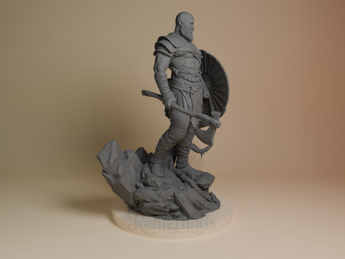 Kratos resin figure standing right profile on rocky base, holding axe and shield, unpainted gray detail, detailed armor and wrapping visible.