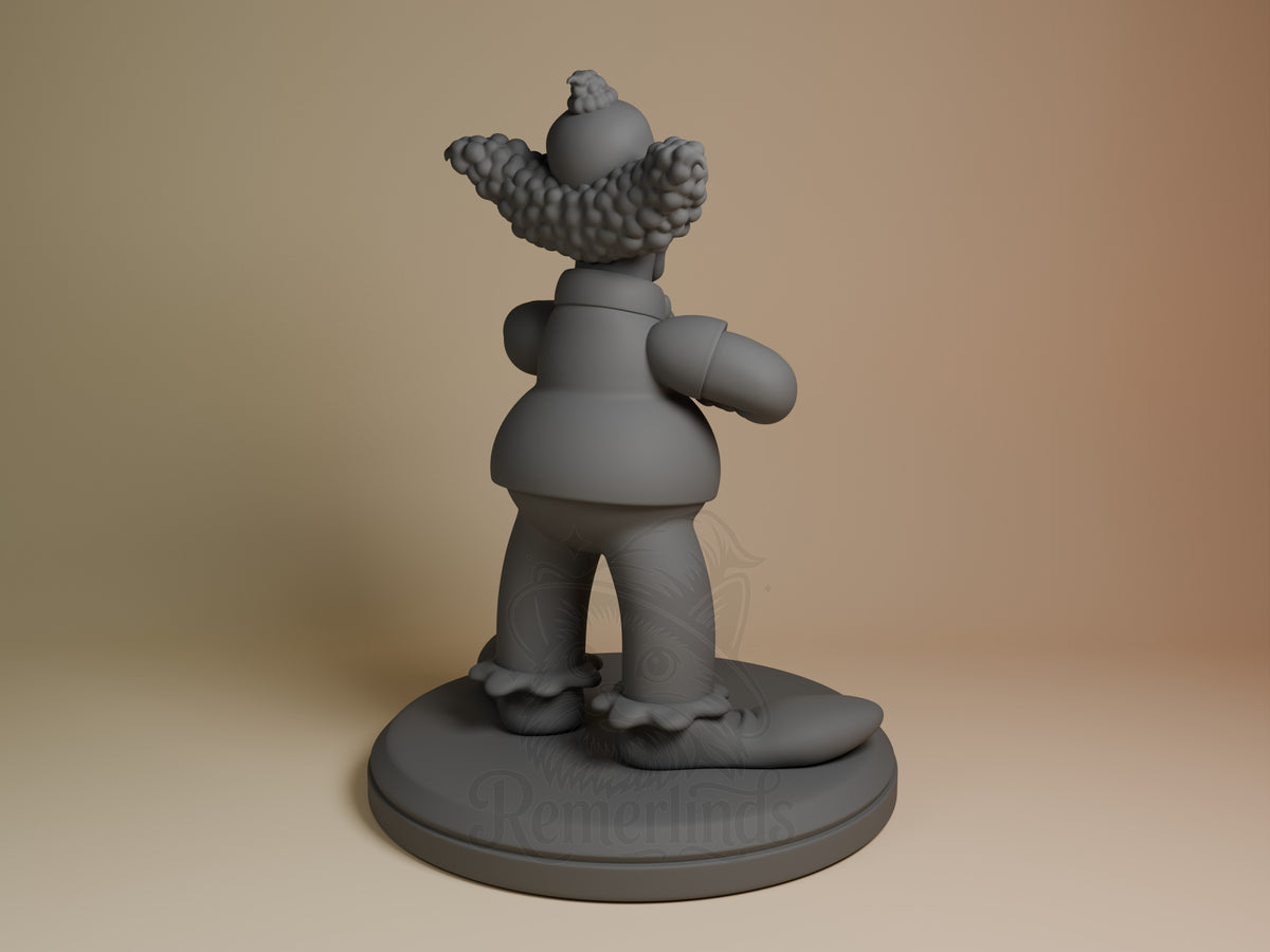 Cackles the Clown resin figure from Springfield Satire viewed from back, showing unpainted gray torso, raised arms with textured details, and circular base.