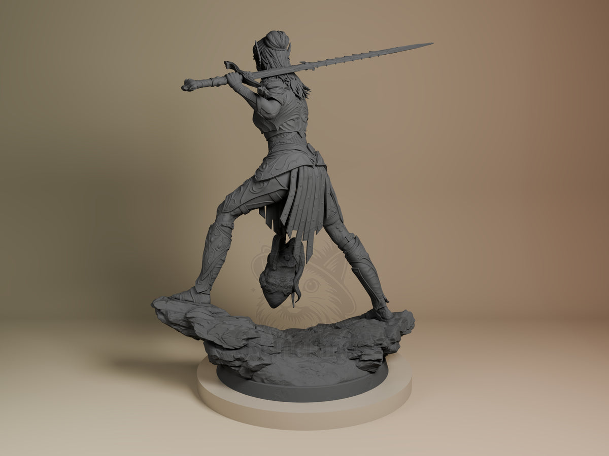 LaeZel resin figure from Baldur's Gate in dynamic combat pose with spear, unpainted gray on rocky base, photographed from left angle.