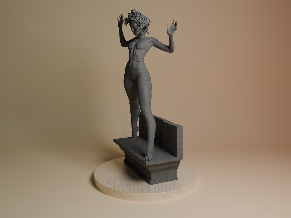 Leeloo from The Fifth Element is an unpainted resin figure posed at an angle with raised hands on a sculpted base.