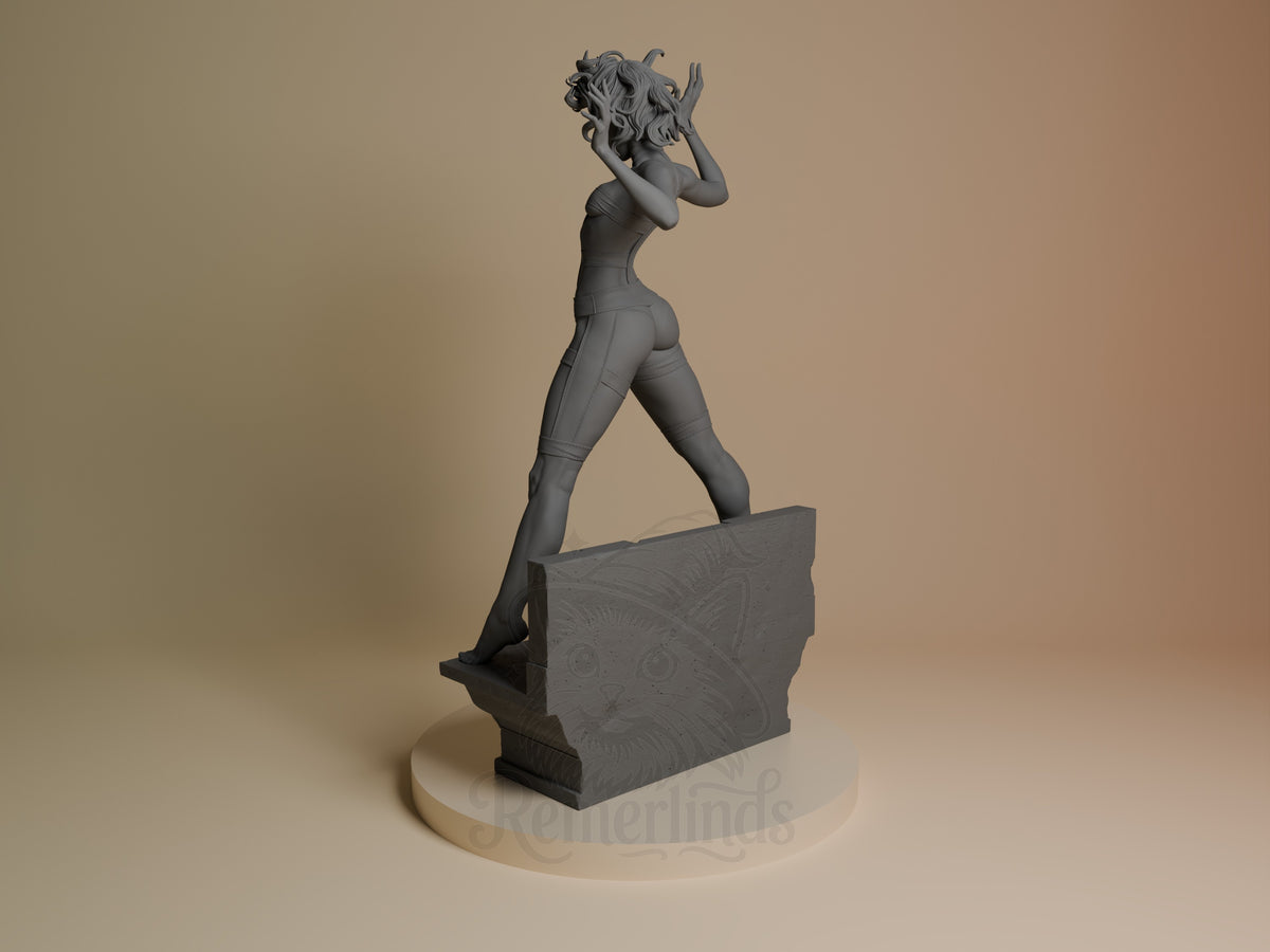 Left-angle view shows Leeloo from The Fifth Element, an unpainted resin figure posing with both hands at her hair on a base.