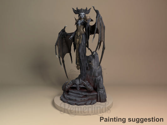Lilith resin figure from Diablo IV standing on dark base with wings spread, horned headdress, painted in black and gold tones with detailed sculpting.