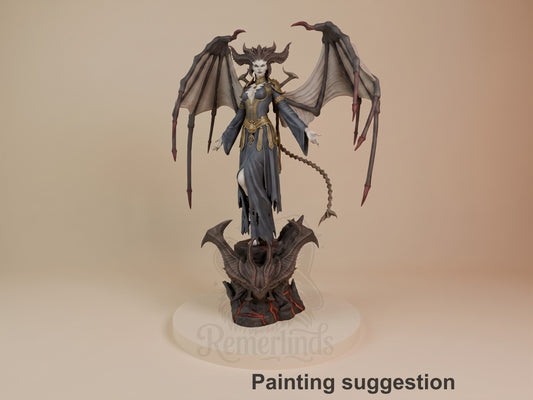 Lilith resin figure from Diablo, painted suggestion, standing on horned base with wings spread, gold and blue armor detail.
