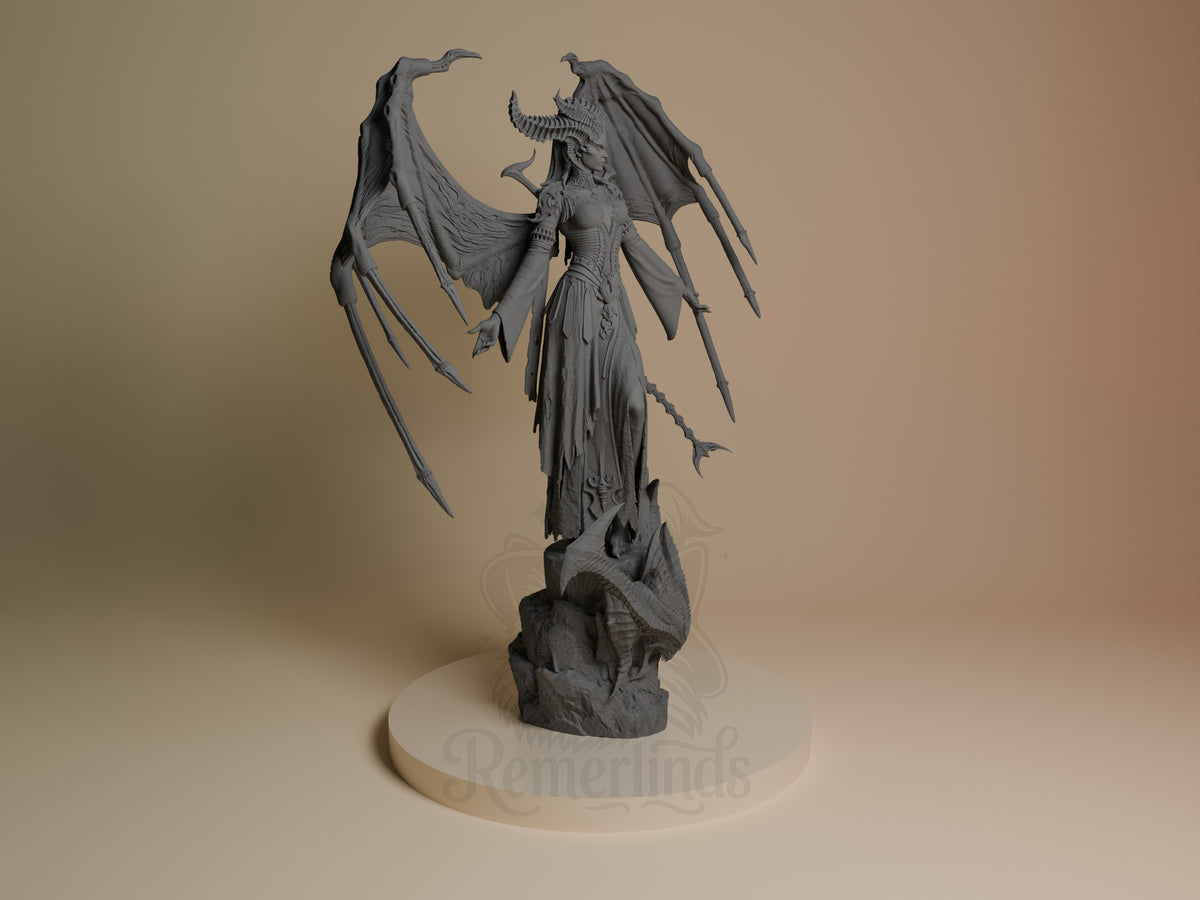 Lilith from Diablo stands in a gray, unpainted resin figure with wings on a sculpted base.