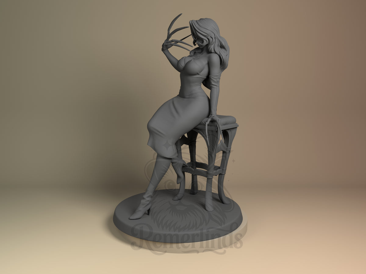 Lust from Fullmetal Alchemist is an unpainted resin figure seated sideways above a sculpted base.