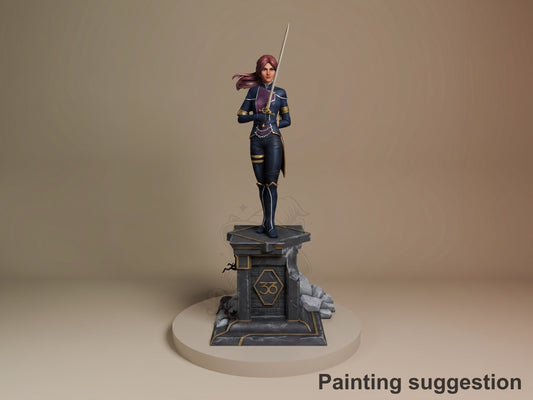 Maelle resin figure from Expedition 33 standing on stone base with sword, purple hair, black and gold outfit, painted sample shown at angle.