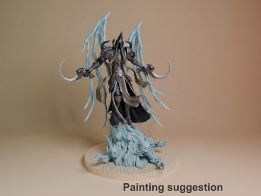 Malthael resin figure from Diablo in painted dark armor with blue ice wings spread wide, mounted on blue crystalline base, front-facing pose.