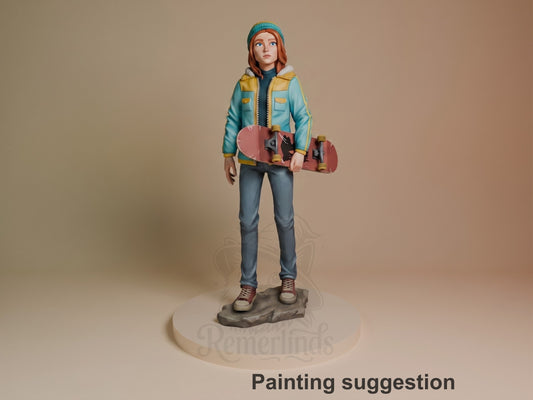 Max from Stranger Things resin figure, painted, standing with skateboard, turquoise jacket and headband, on gray base.