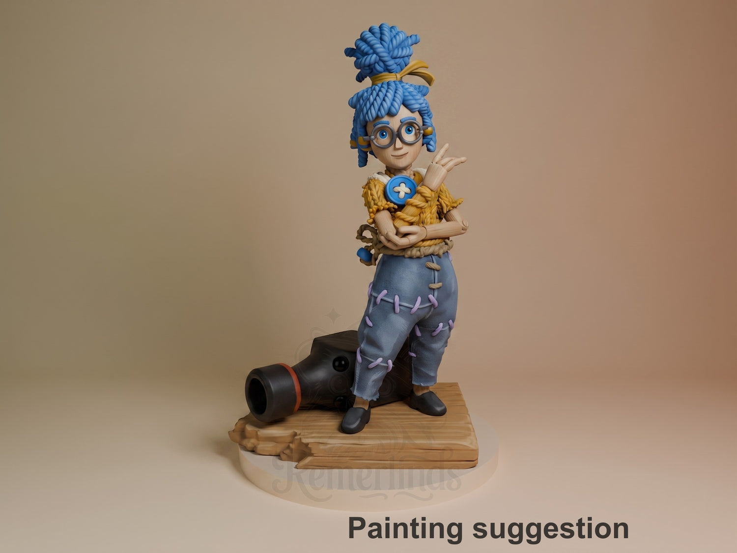 May from Two Are Needed, a painted resin figure with blue hair and goggles, wearing a yellow jacket and patched pants, posed on a wooden base with a cannon.