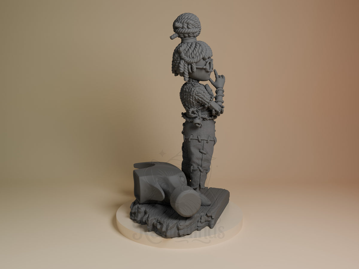 May from Two Are Needed resin figure shown from the side, standing on decorative base with large cylindrical element, unpainted gray resin.