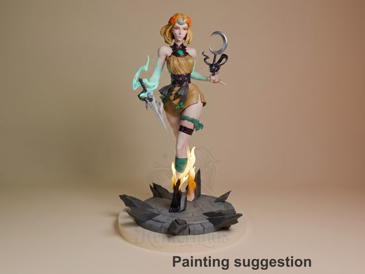 Melinoe resin figure from Hades standing posed with sword and staff, painted in gold, green and black on a dark rocky base against neutral background.