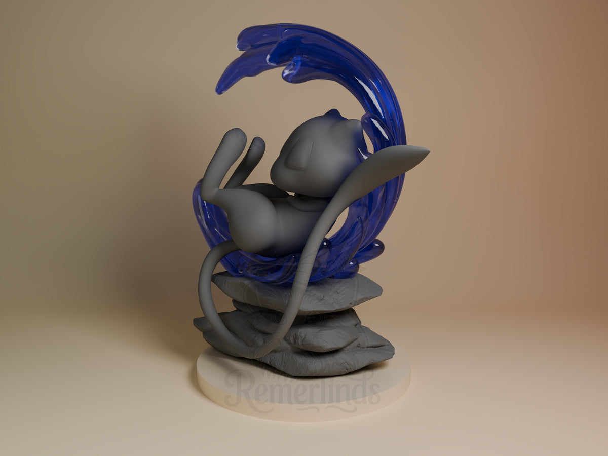 Mew from Pokémon resin figure, side view, curled on a sculpted rock base with an unpainted gray body and blue tail.