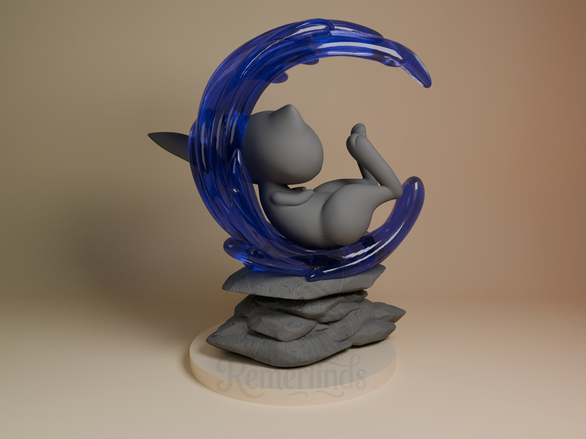 Back view of Mew from Pokémon, an unpainted resin figure seated in its painted blue tail on a rock base.