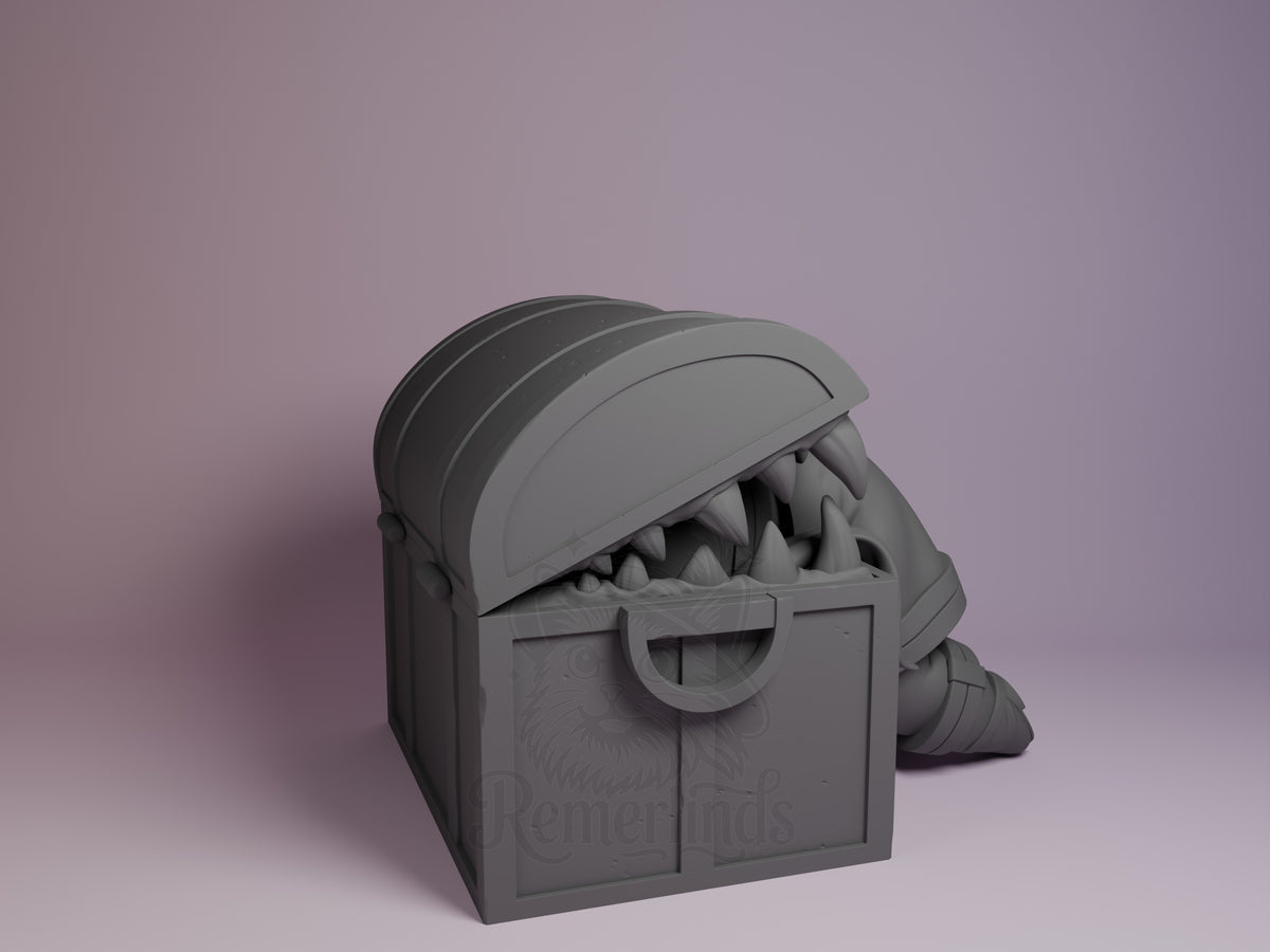 Gray resin Chibi Mimic Chest figure from Frieren: Beyond Journey's End shown from back angle, displaying unpainted sculpted details and hinged lid mechanism against purple background.