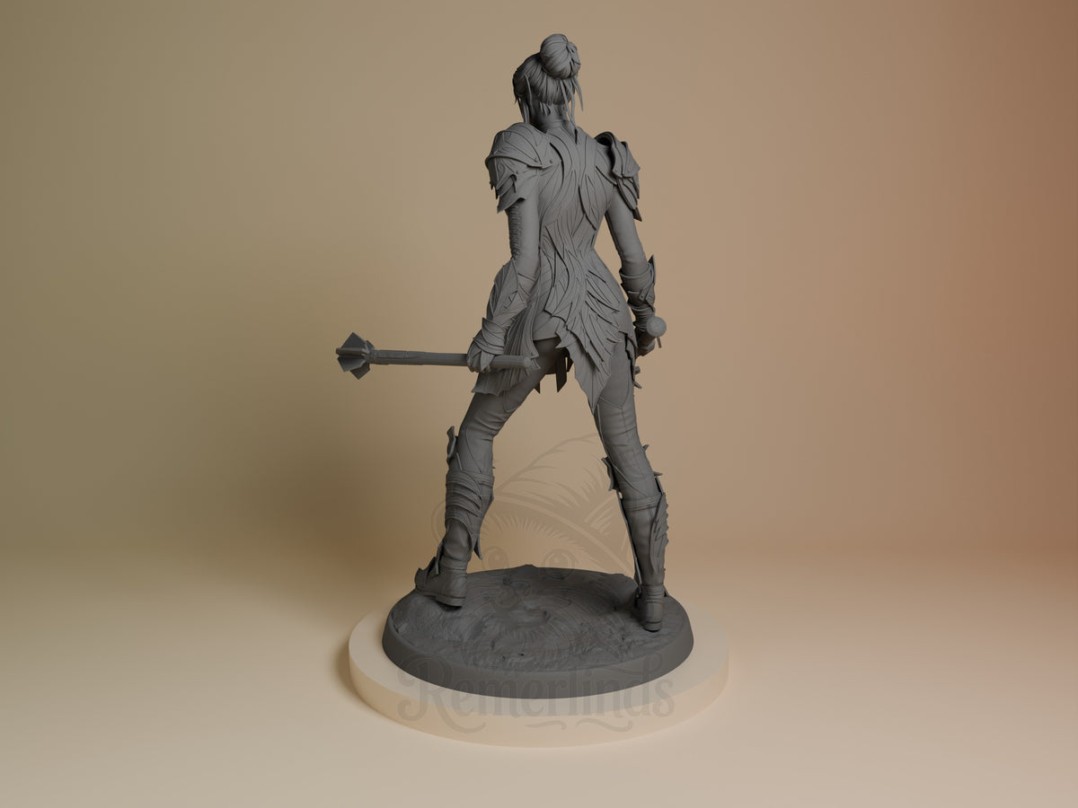 Unpainted gray resin figure of Minthara from Baldur's Gate shown from behind, wielding an axe, on a circular base.