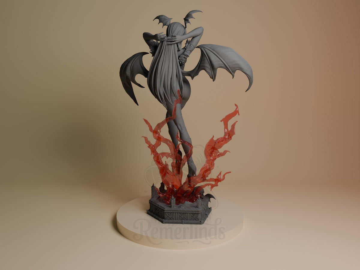Back view of Morrigan Aensland from Dark Stalkers shows a gray resin figure with red painted parts, raised wings, and a base.
