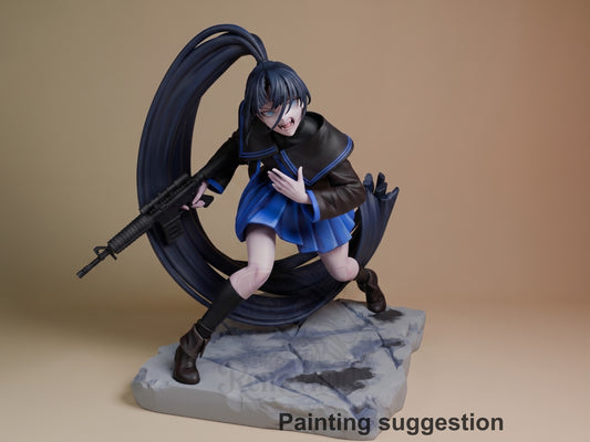 Naima from Ado 3D printed resin figure in dynamic pose wielding weapon, blue and black outfit, painted on rocky base against neutral background.