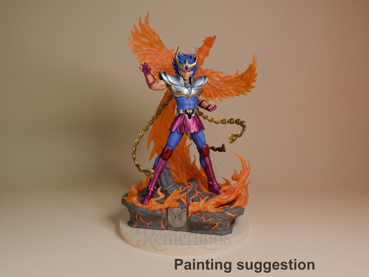 Phoenix Ikki resin figure in dynamic pose with flaming orange wings, blue armor, and gold chain, painted on fire-effect base with crest emblem.