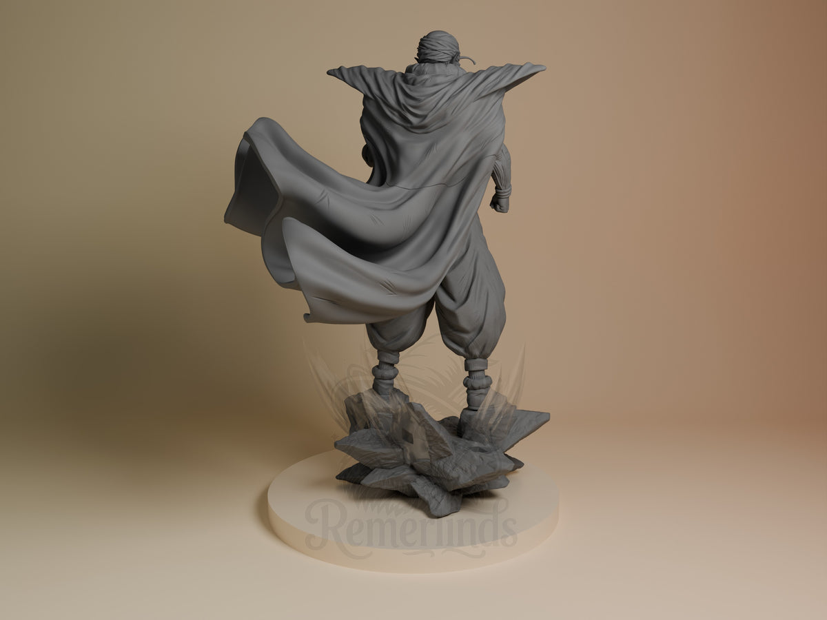 Green Warrior Monk from Dragon Sphere Y resin figure shown from behind with arms outstretched, flowing cape, unpainted gray finish on rocky base.