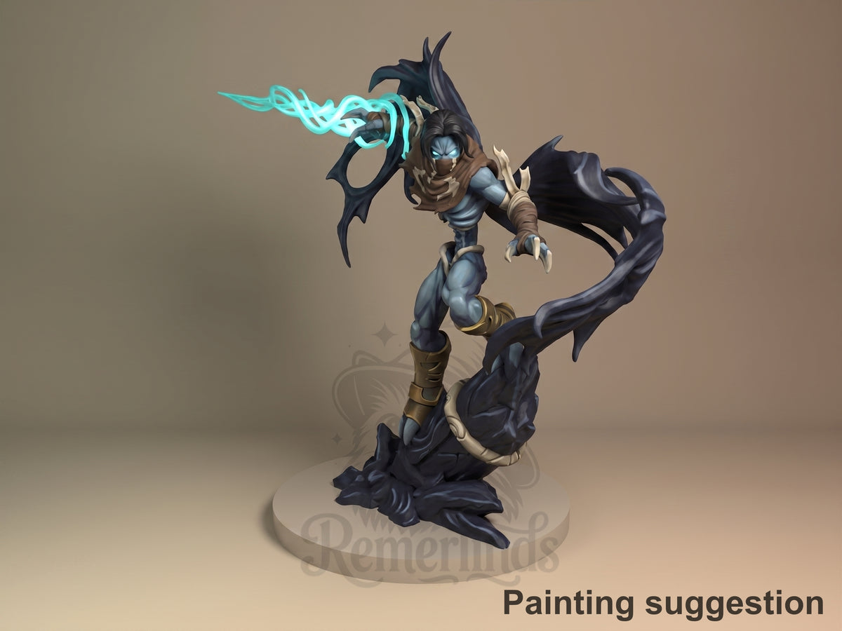 Three-quarter painted Raziel from Soul Reaver resin figure lunges with cape and tail above a sculpted base.
