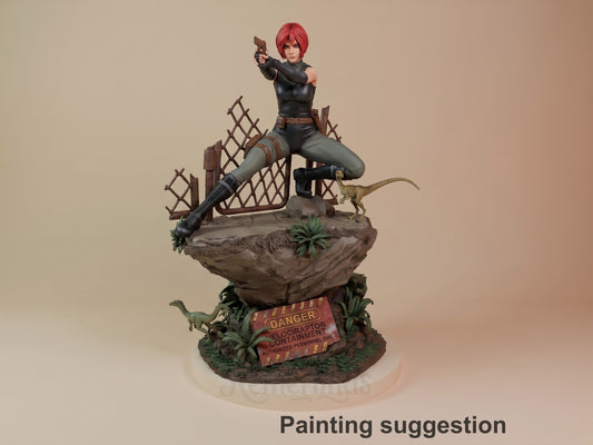 Painted Regina from Dino Crisis resin figure aims a pistol while posed on a dinosaur sculpted base.