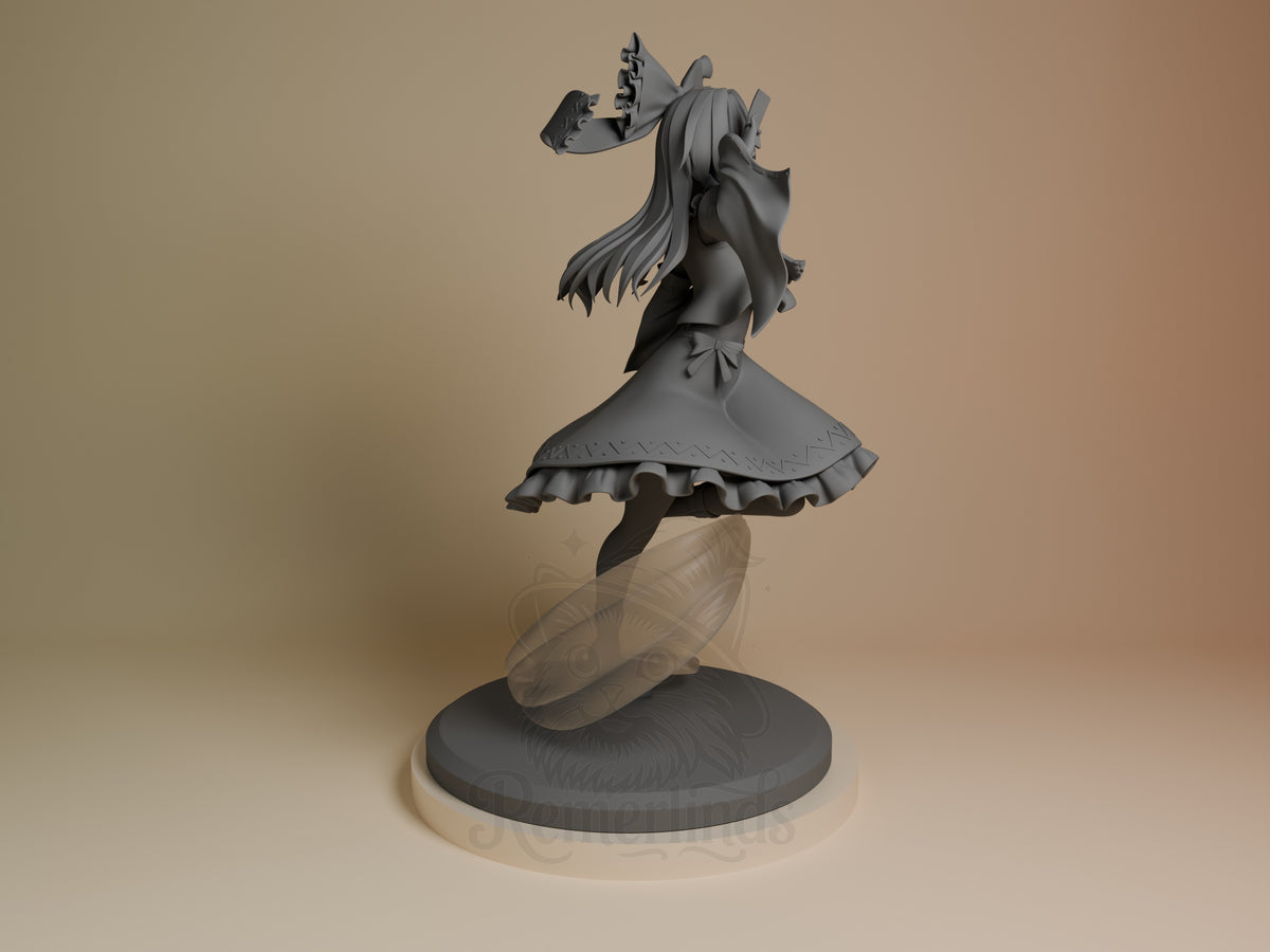 Reimu Hakurei resin figure in dynamic pose on circular base, shown from right side angle with unpainted grey finish and translucent wing detail.