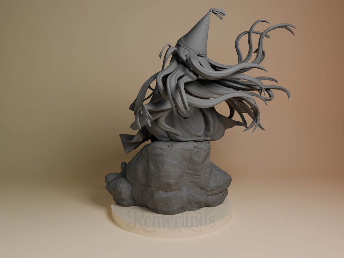 Richeh from Witch Hat Atelier is an unpainted resin figure, viewed from the left rear on a rocky sculpted base.