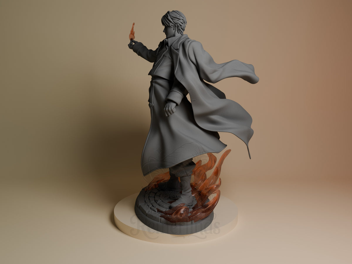 Roy Mustang resin figure in three-quarter view, unpainted gray with painted red flame base, cape billowing, arm raised commandingly.