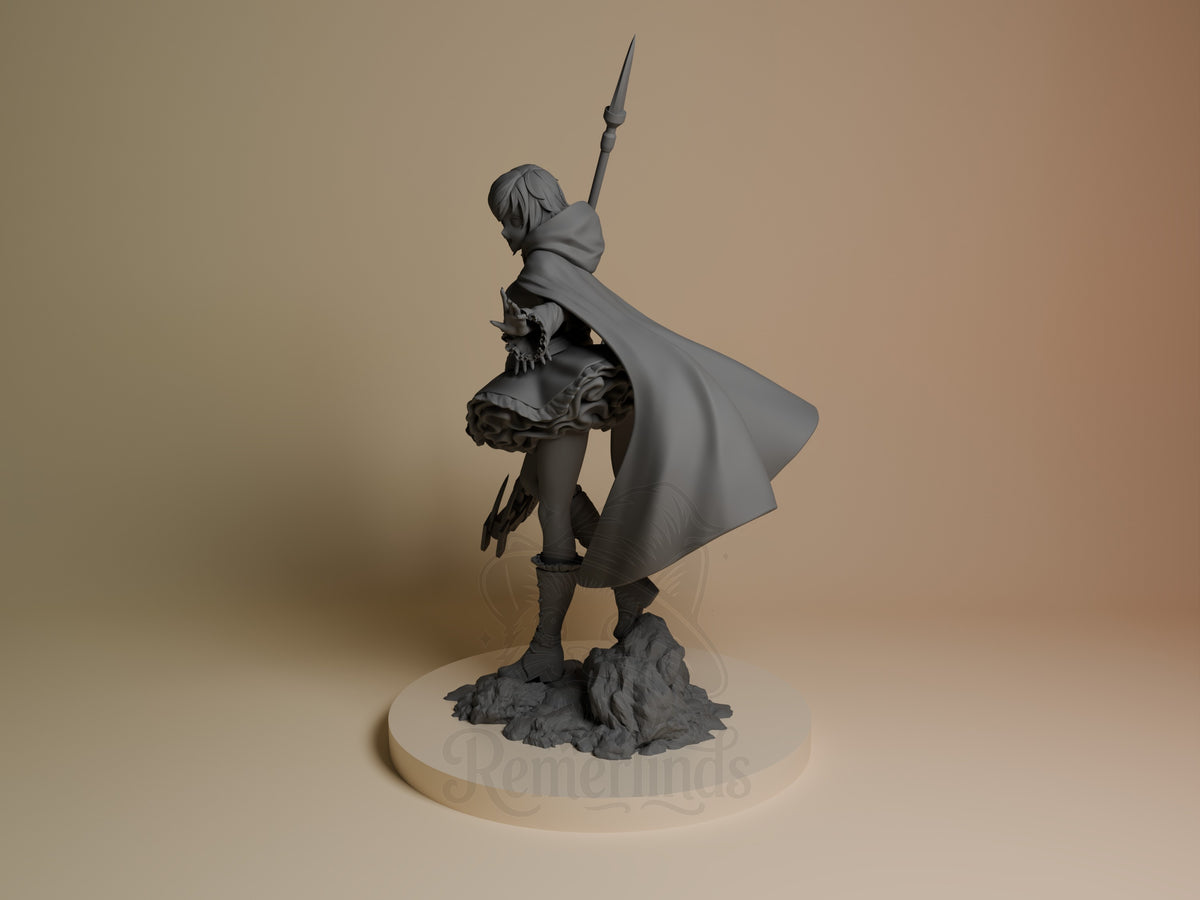 Ruby Rose resin figure from RWBY shown at angle, holding staff weapon with flowing cape, unpainted gray finish on rocky base.
