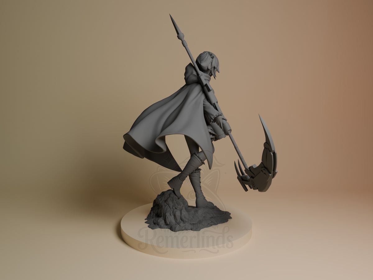 Ruby Rose resin figure shown from back view, wielding scythe and gun, flowing cape, unpainted gray finish on cream base.