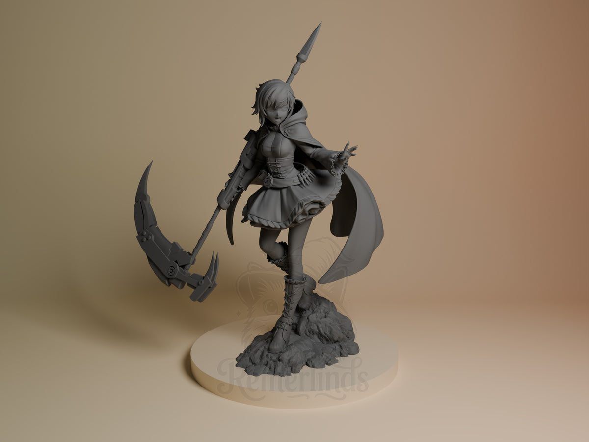 Ruby Rose resin figure from RWBY shown from front, unpainted gray, wielding scythe and gun with flowing cape, standing on rocky base.