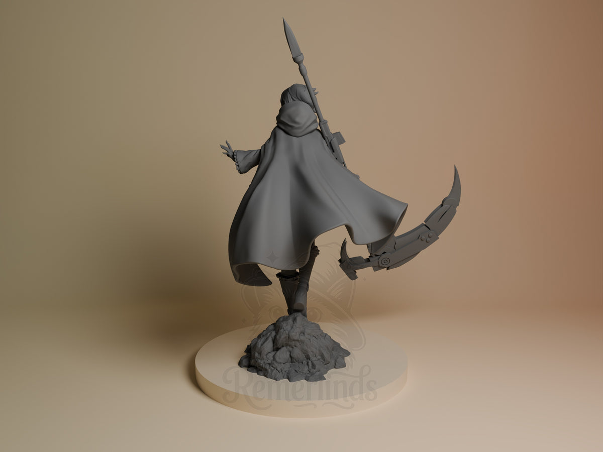 Ruby Rose resin figure in gray primer, posed dynamically with scythe raised, flowing cape, standing on rocky base, front-left angle view.