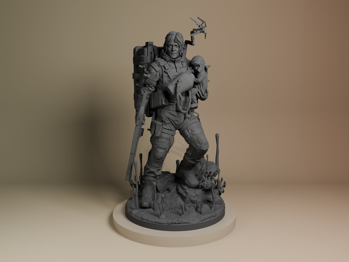 Sam from Death Stranding 3D resin figure shown front-facing in dynamic pose with rifle, backpack, and holding creature, on textured base.