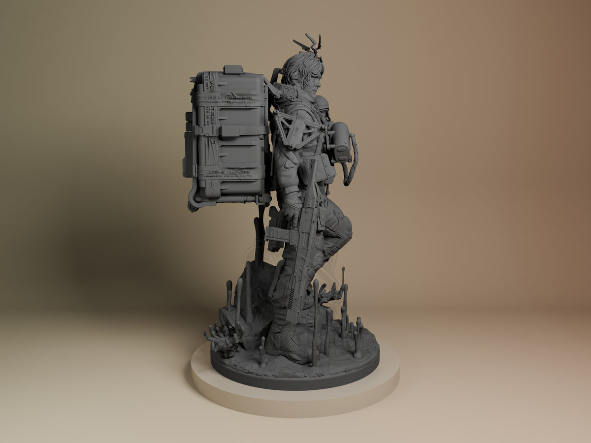 Sam from Death Stranding resin figure shown in right profile, unpainted gray, carrying cargo backpack, detailed base with spikes, on white platform.