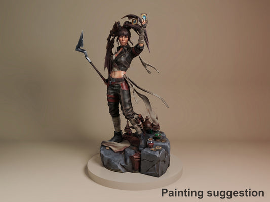 Sciel resin figure from Expedition 33 in dynamic pose holding staff and artifact aloft, painted in dark leather and burgundy tones on sculpted rocky base.