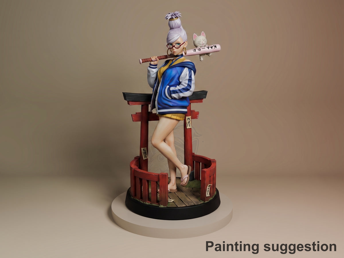 Painted Seiko resin figure from Dandadan stands cross-legged with a bat on a torii gate base.