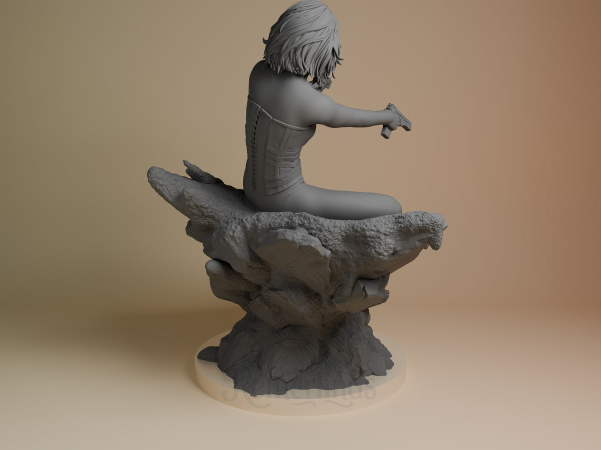 Selene from Underworld is an unpainted resin figure, seated on a rocky base in rear view.