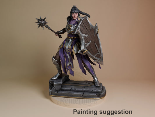 Shadowheart resin figure from Baldur's Gate displayed at three-quarter angle, painted in purple and black armor with spiked mace and shield, standing on black base.
