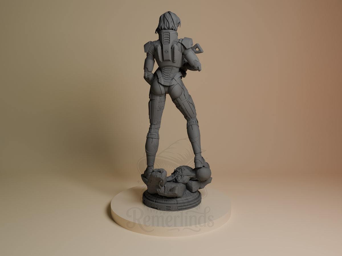 Shepard from Mass Effect stands in a rear pose as an unpainted resin figure on a rocky base.