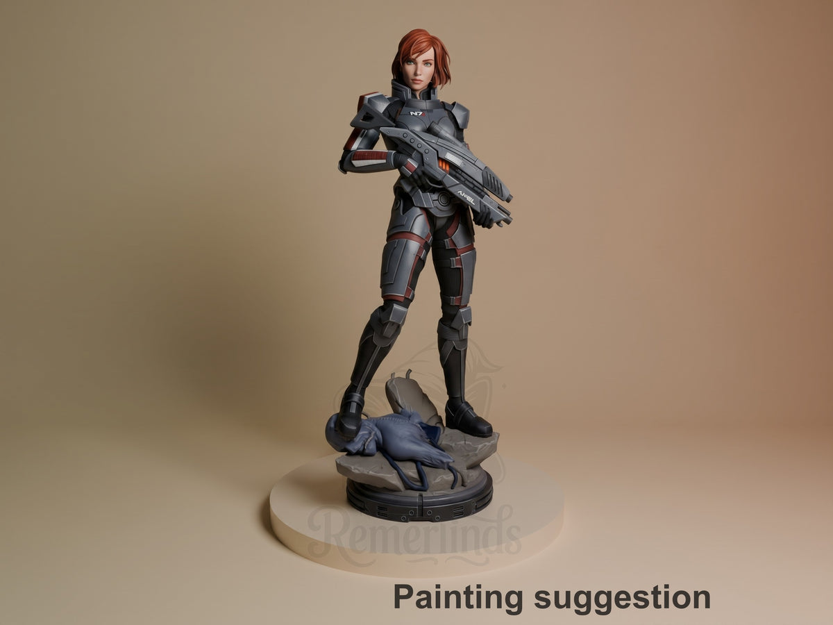 Shepard from Mass Effect is a painted resin figure standing with a rifle on a sculpted base.