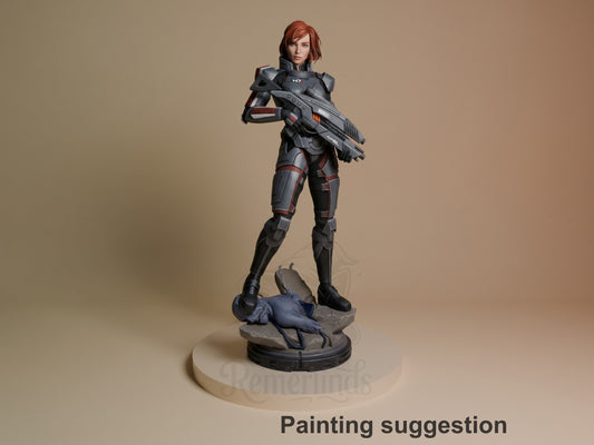 Shepard from Mass Effect is a painted resin figure standing with a rifle on a sculpted base.