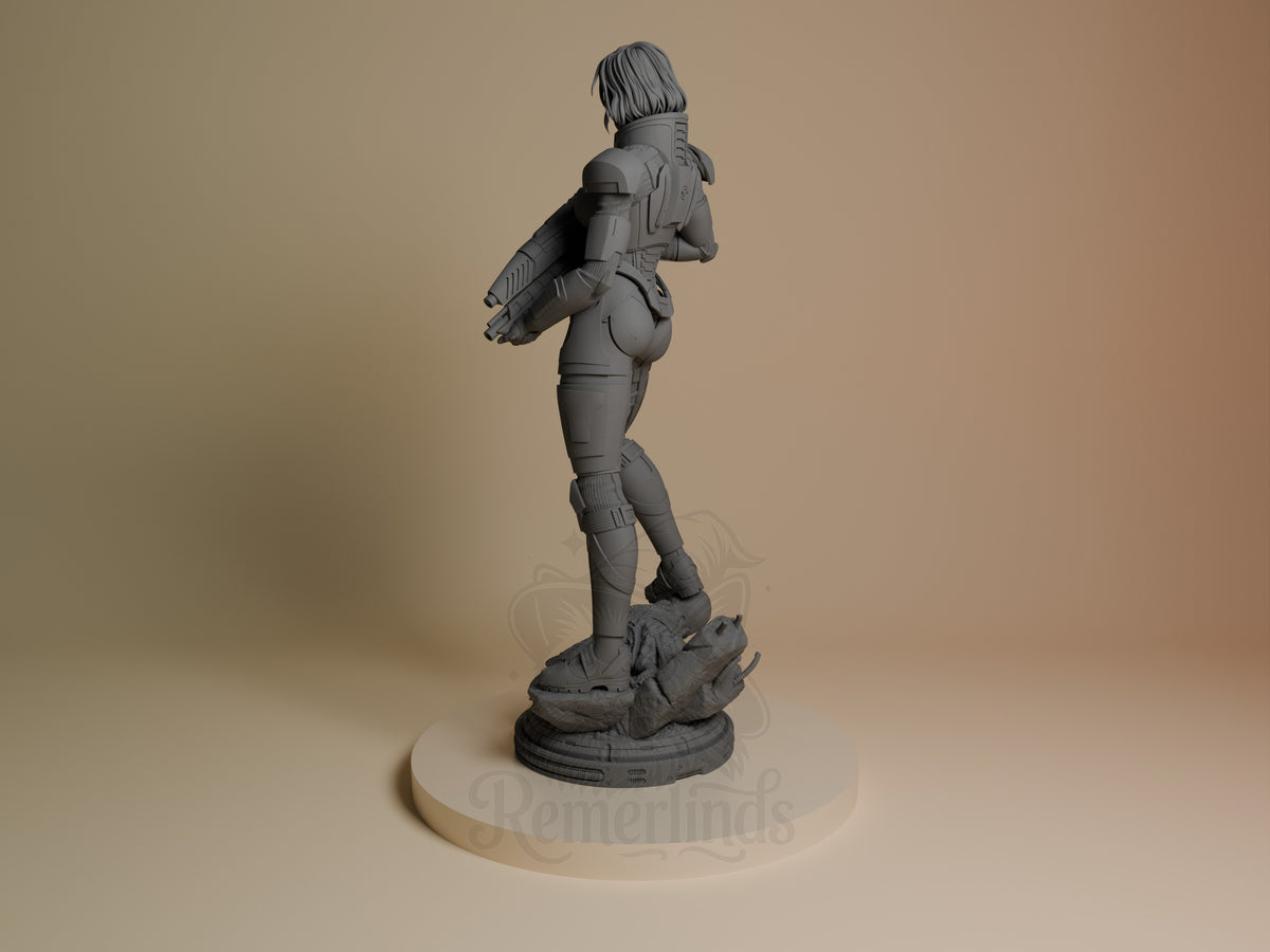 Unpainted resin figure of Shepard from Mass Effect shows an armored rear view on a sculpted base.