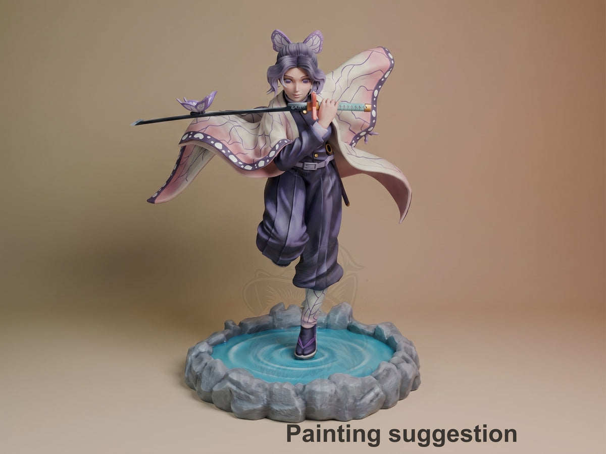 Shinobu Kocho resin figure in dynamic pose on circular water base, purple hair with butterfly motif, holding staff, painted with detailed costume and butterfly wings.