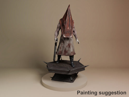 Pyramid Head resin figure standing on dark octagonal base, wearing blood-stained tunic and iconic pyramid helmet, holding large blade, painted with weathered finish.
