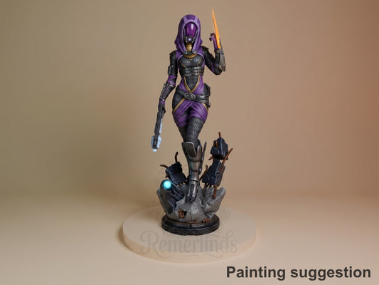 Tali'Zorah Vas Normandy resin figure in purple and black armor, holding glowing sword and gun, standing on detailed base with blue accent lighting.