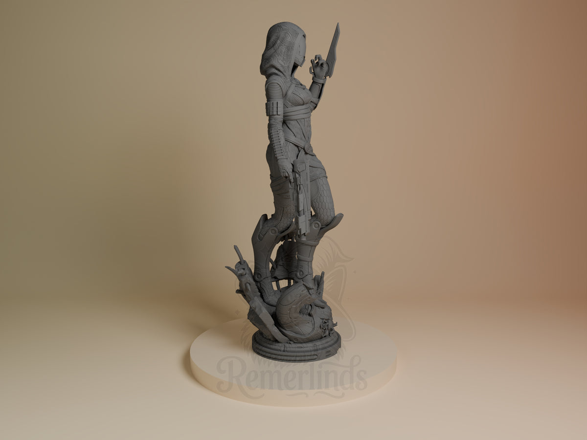 Unpainted resin figure of Tali'Zorah Vas Normandy from Mass Effect stands armed on a sculpted base, viewed from the right.