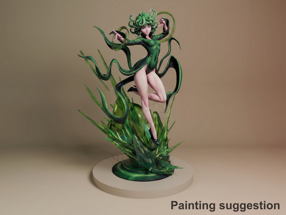 Tatsumaki resin figure in dynamic pose with green hair and tendrils, kneeling on painted base with layered green vegetation details, professional paint job.